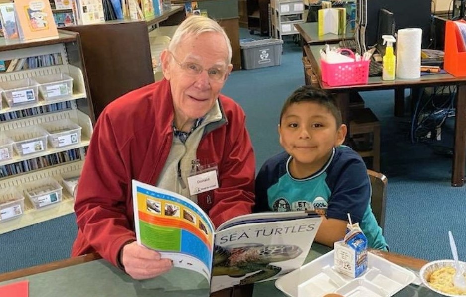 Don Shannon reads with Christofer